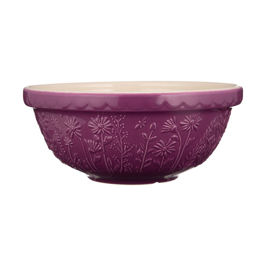 Purple ceramic bowl with floral patterns on a white background