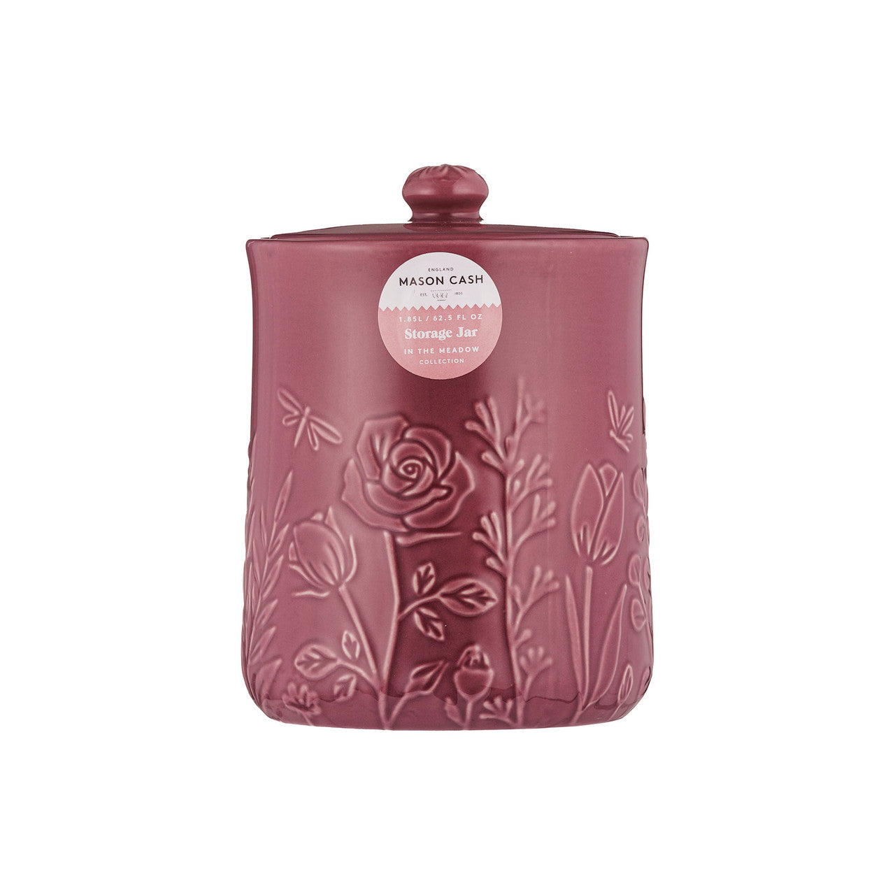 Pink storage jar with floral embossing on a white background