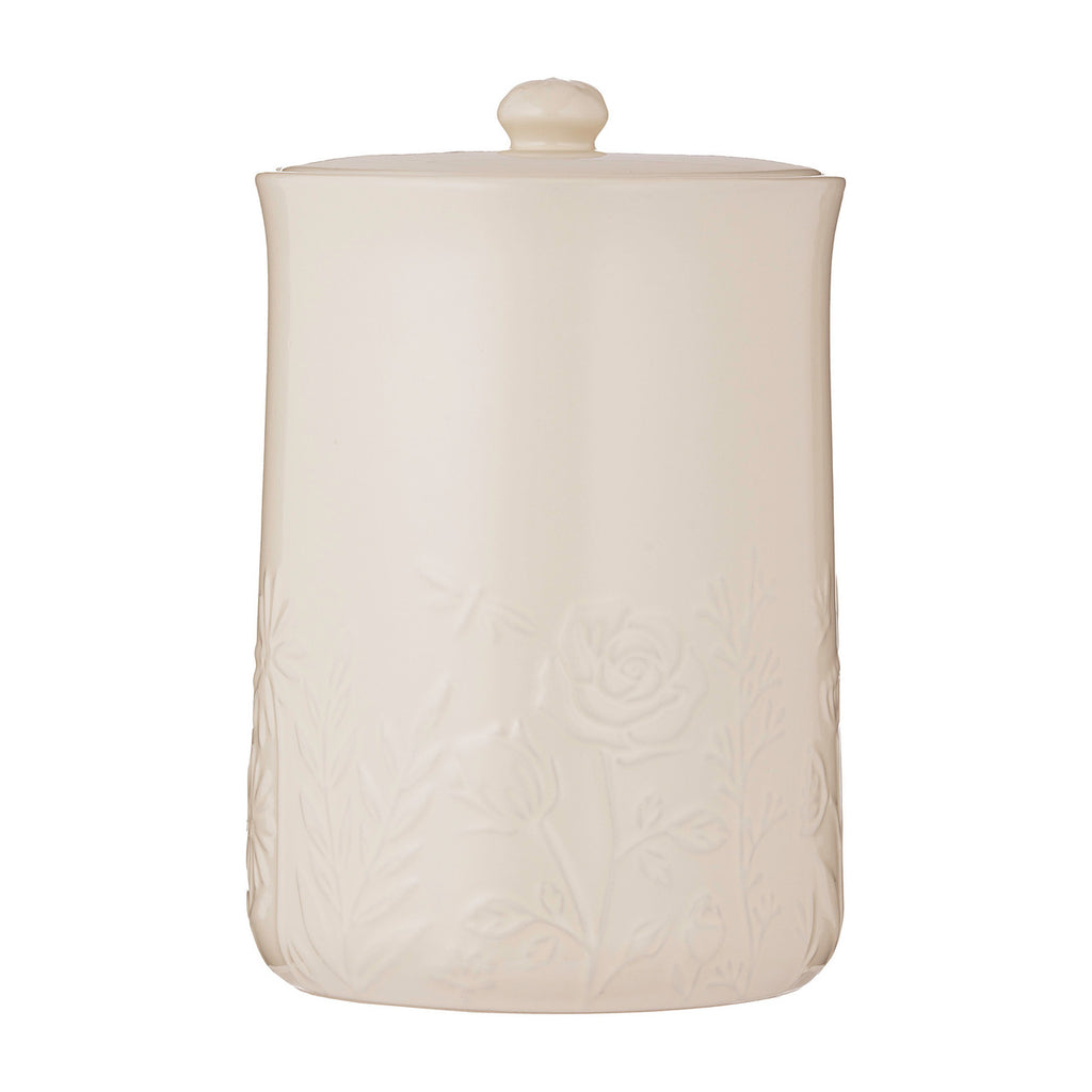 White ceramic jar with lid on a white background