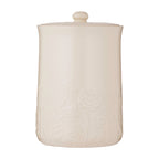 White ceramic jar with lid on a white background