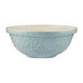 Decorative light blue ceramic bowl with intricate patterns on a white background