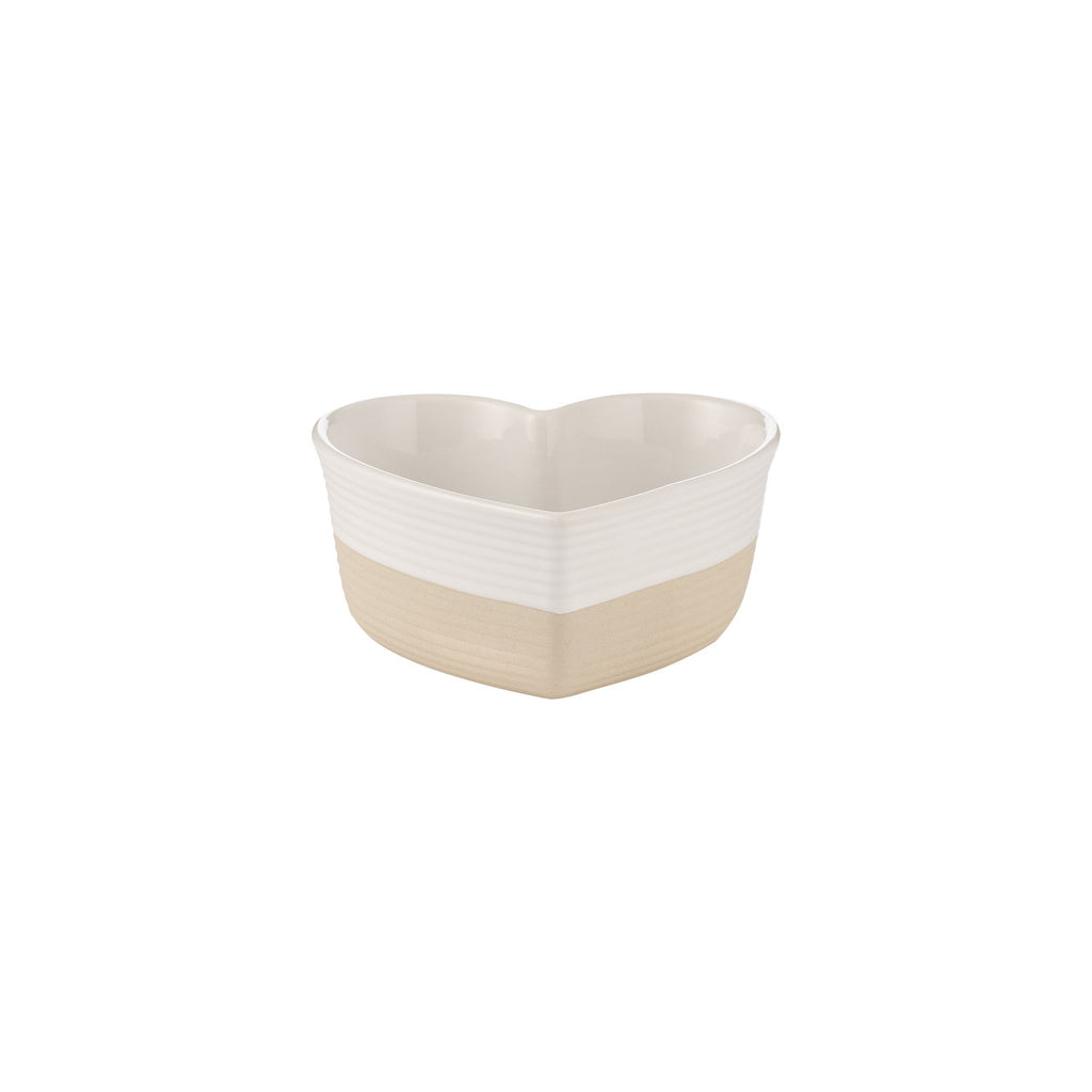 Heart-shaped ceramic bowl with two-tone design on a white background