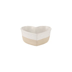 Heart-shaped ceramic bowl with two-tone design on a white background
