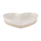 Heart-shaped ceramic bowl on a white background
